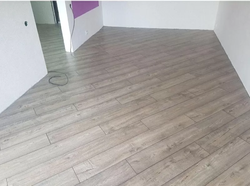 Укладка ламината, кварцвинилового ламината,  укладка линолеума 